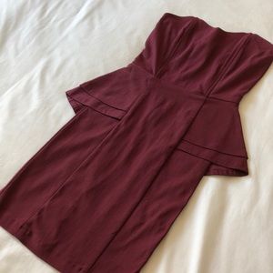 Strapless burgundy peplum style dress